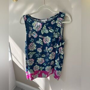 Blue tank top with a colorful floral print  size small in womens